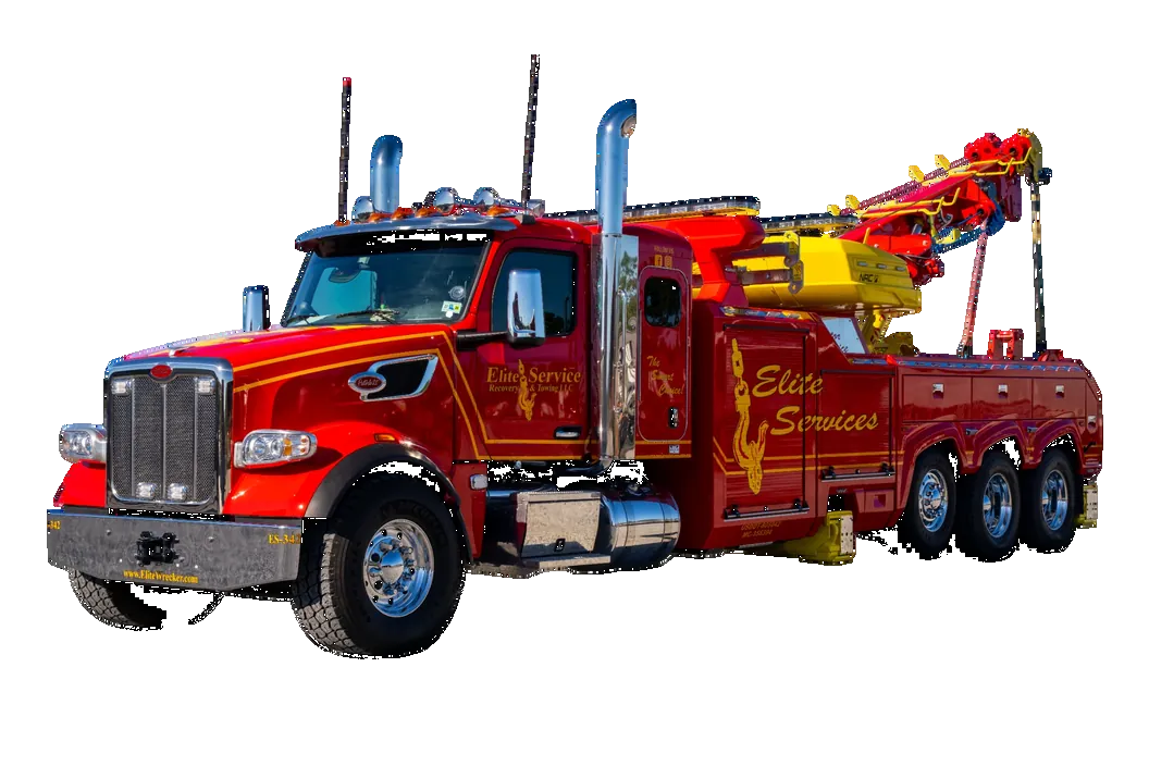Red Recovery Truck With Elevated Boom