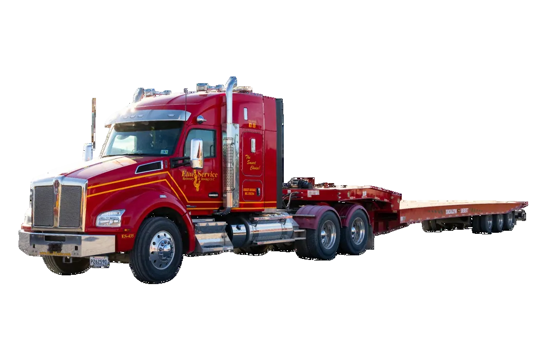 Semi Tractor Pulling Lowboy Equipment Trailer