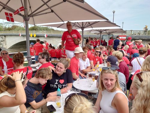 People in country shirts sitting together