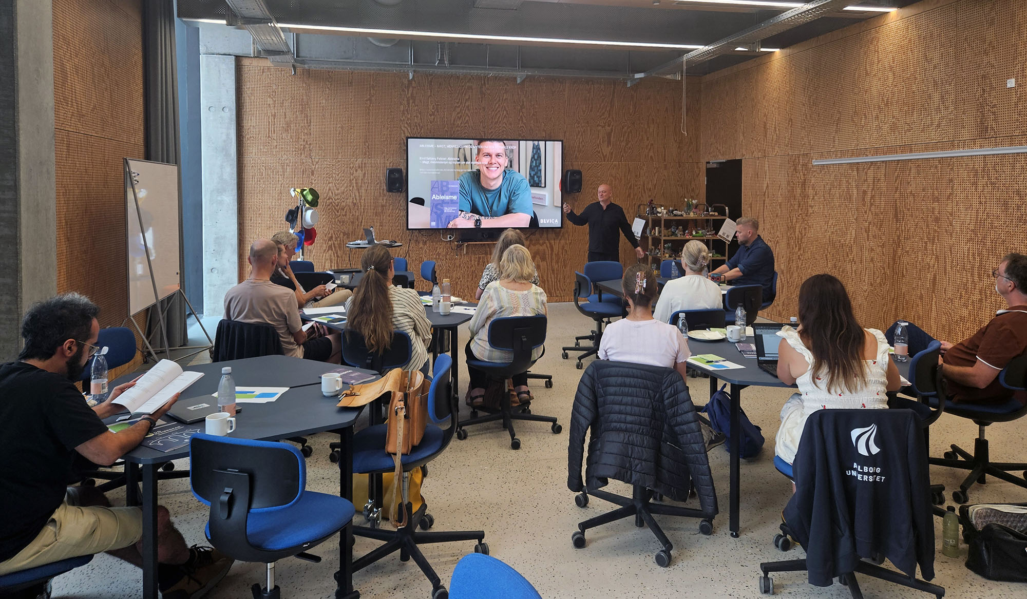 Participants in conversation during the event to kickoff the partnership.