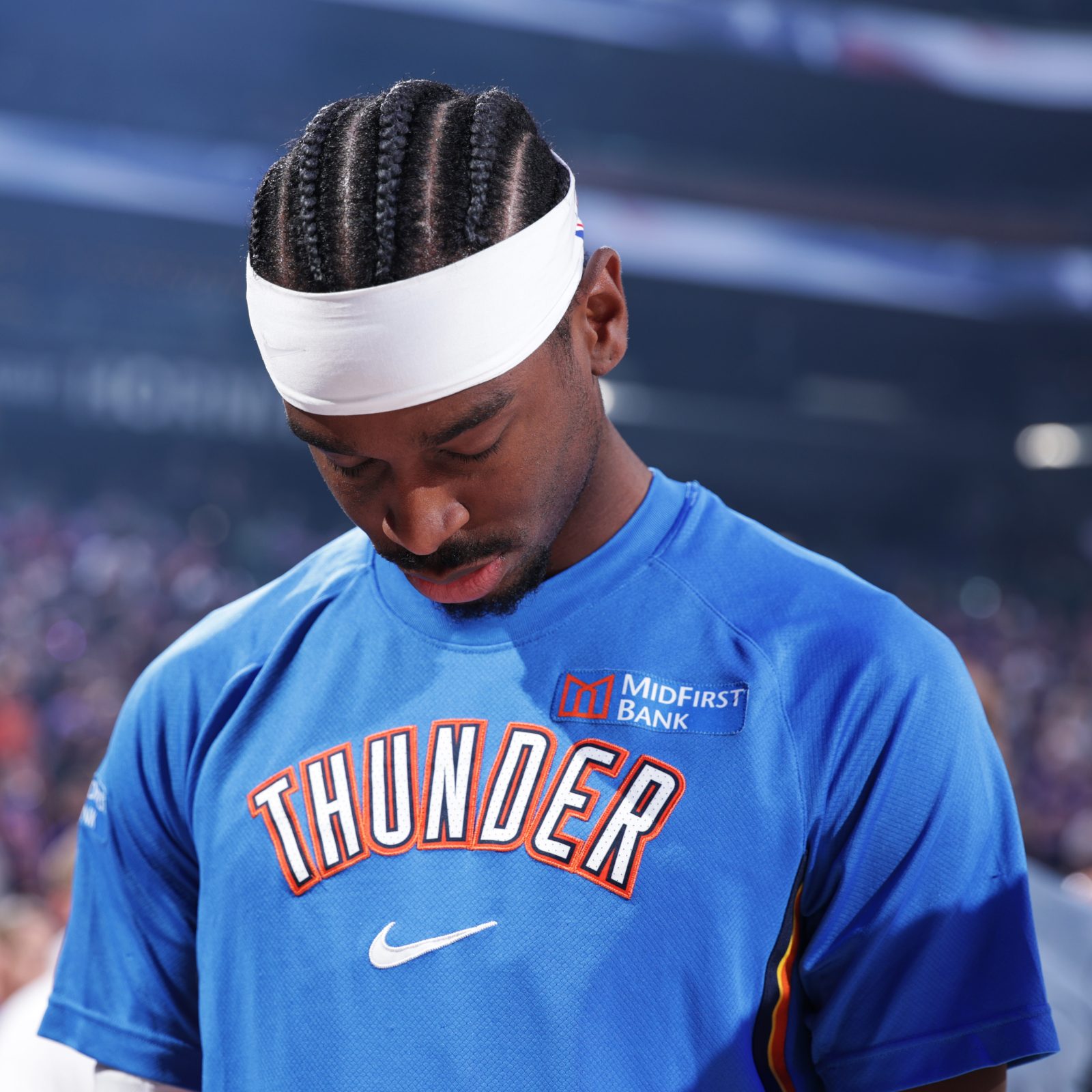 Shai Gilgeous-Alexander #2 of the Oklahoma City Thunder stands for the National Anthem before the game