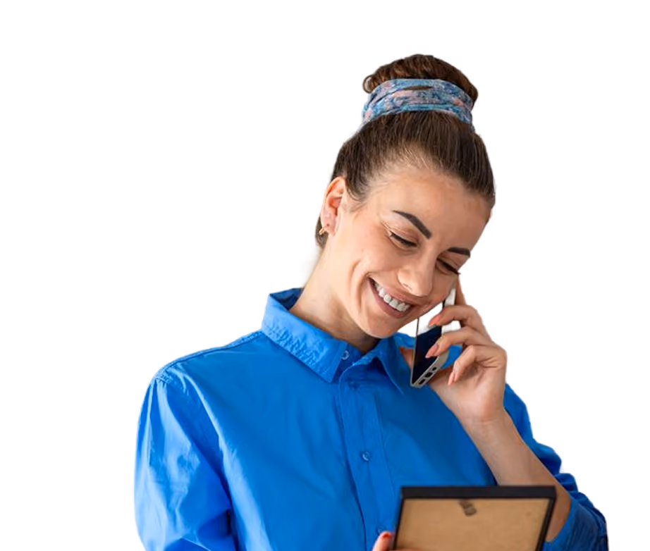 stock photo of woman on the phone looking at a picture frame