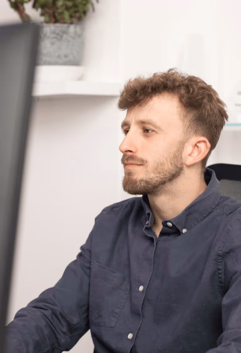 MyOutreach colleague looking at a screen