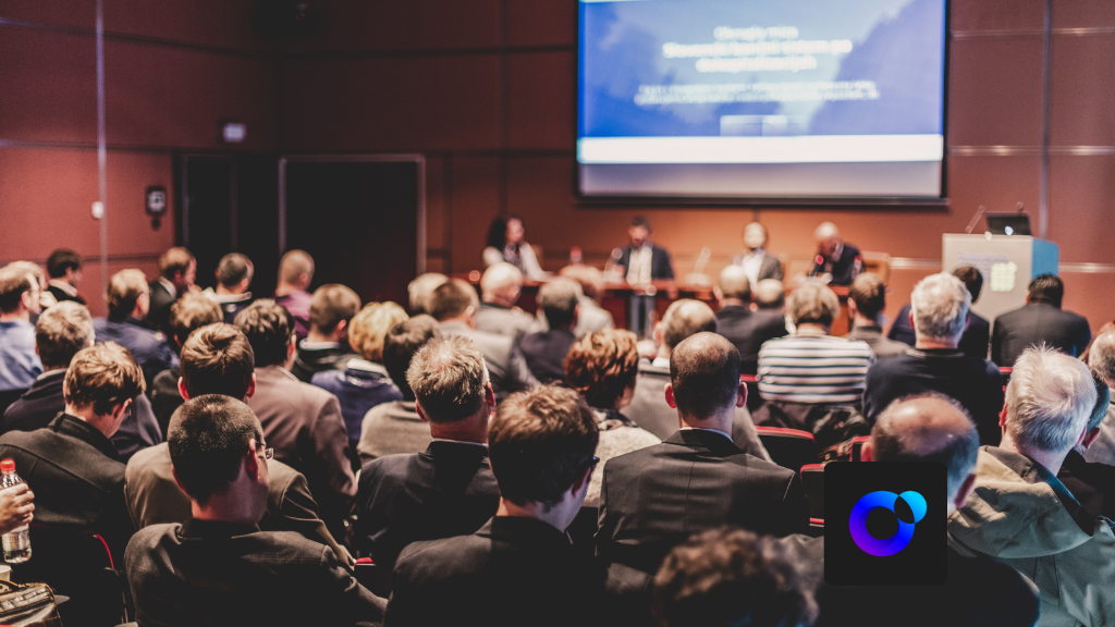 Corporate event setup with professional presentation and audience