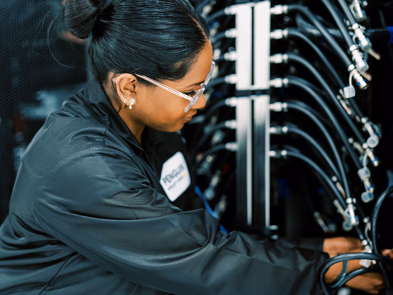 Technician works in server rack