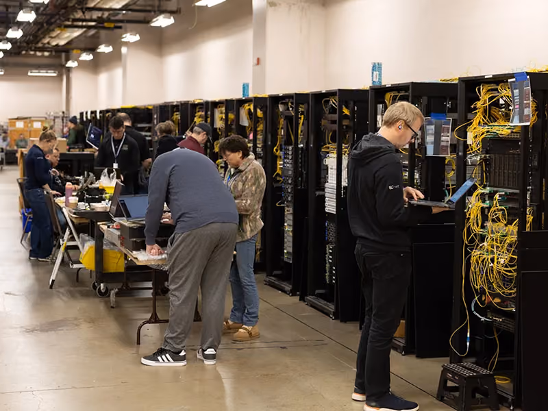 Students working on server racks