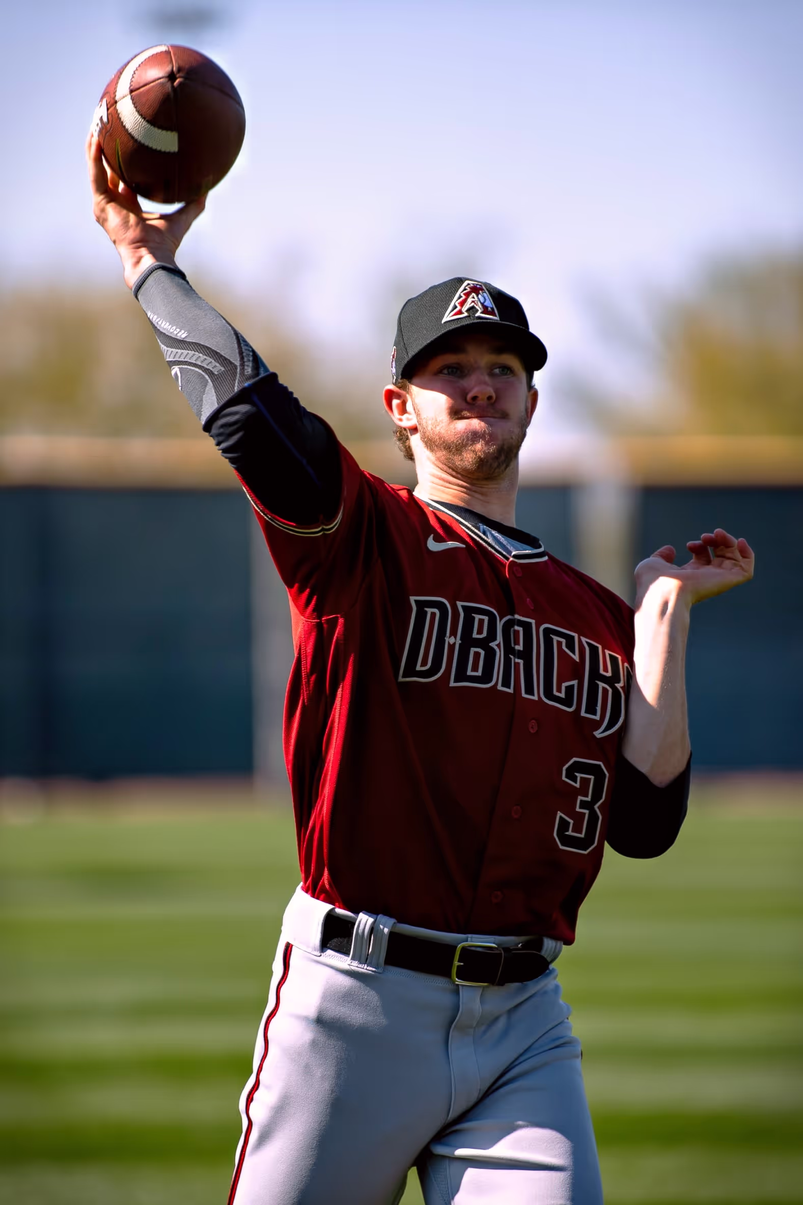 Matt Tabor throwing a football