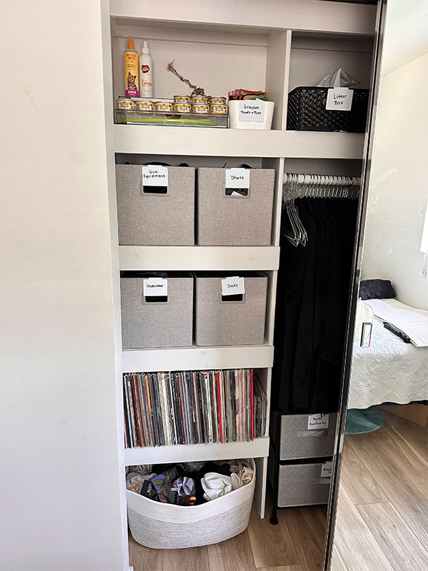 An organized closet with uniform hangers