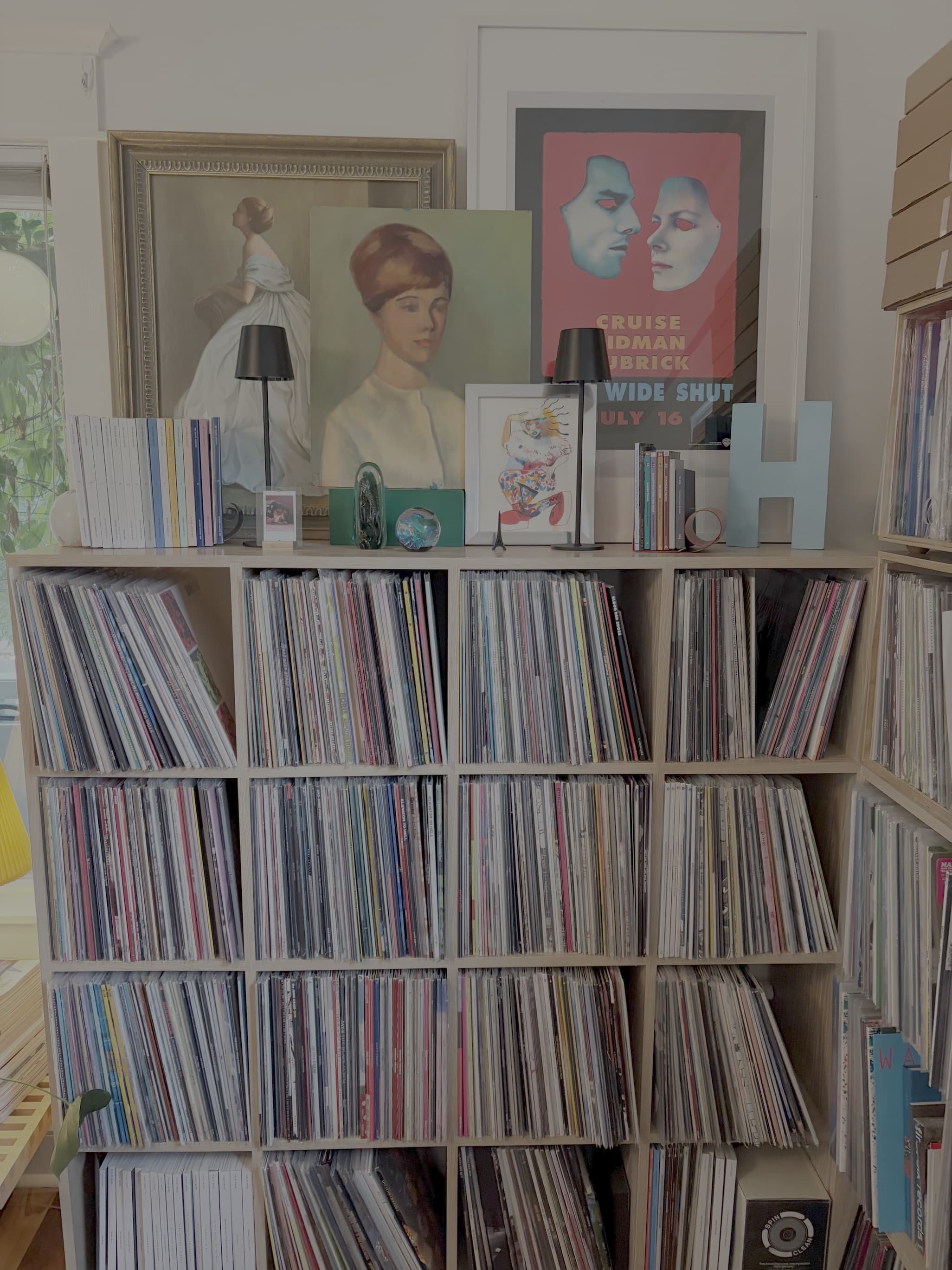 A tidy, organized home space with neatly arranged storage in bright natural light