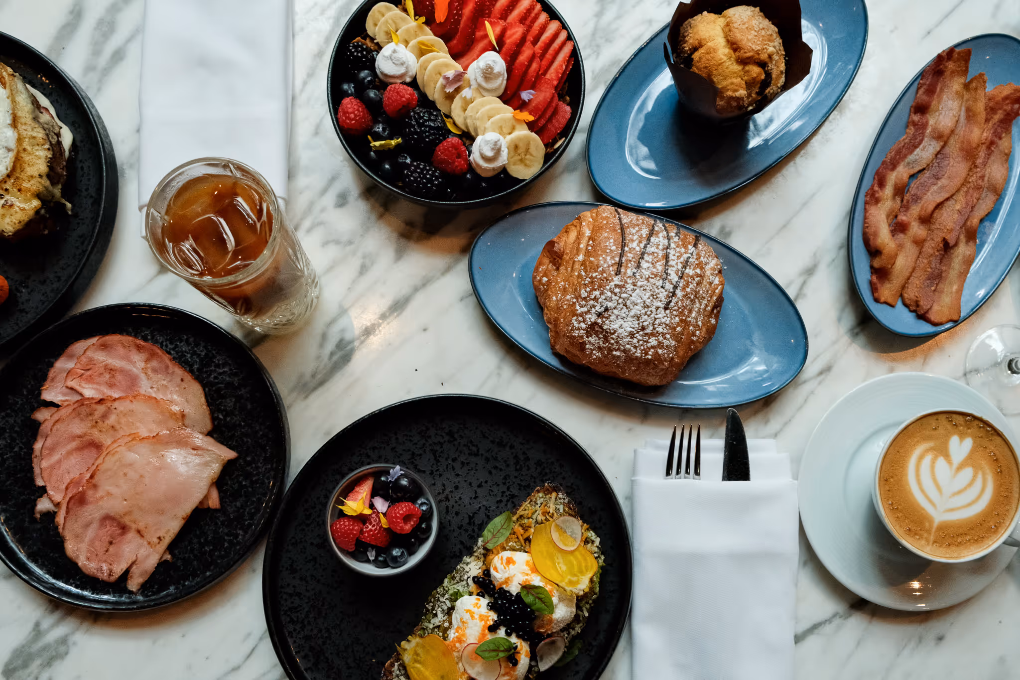 Table of breakfast dishes at Paradox Hotel Vancouver