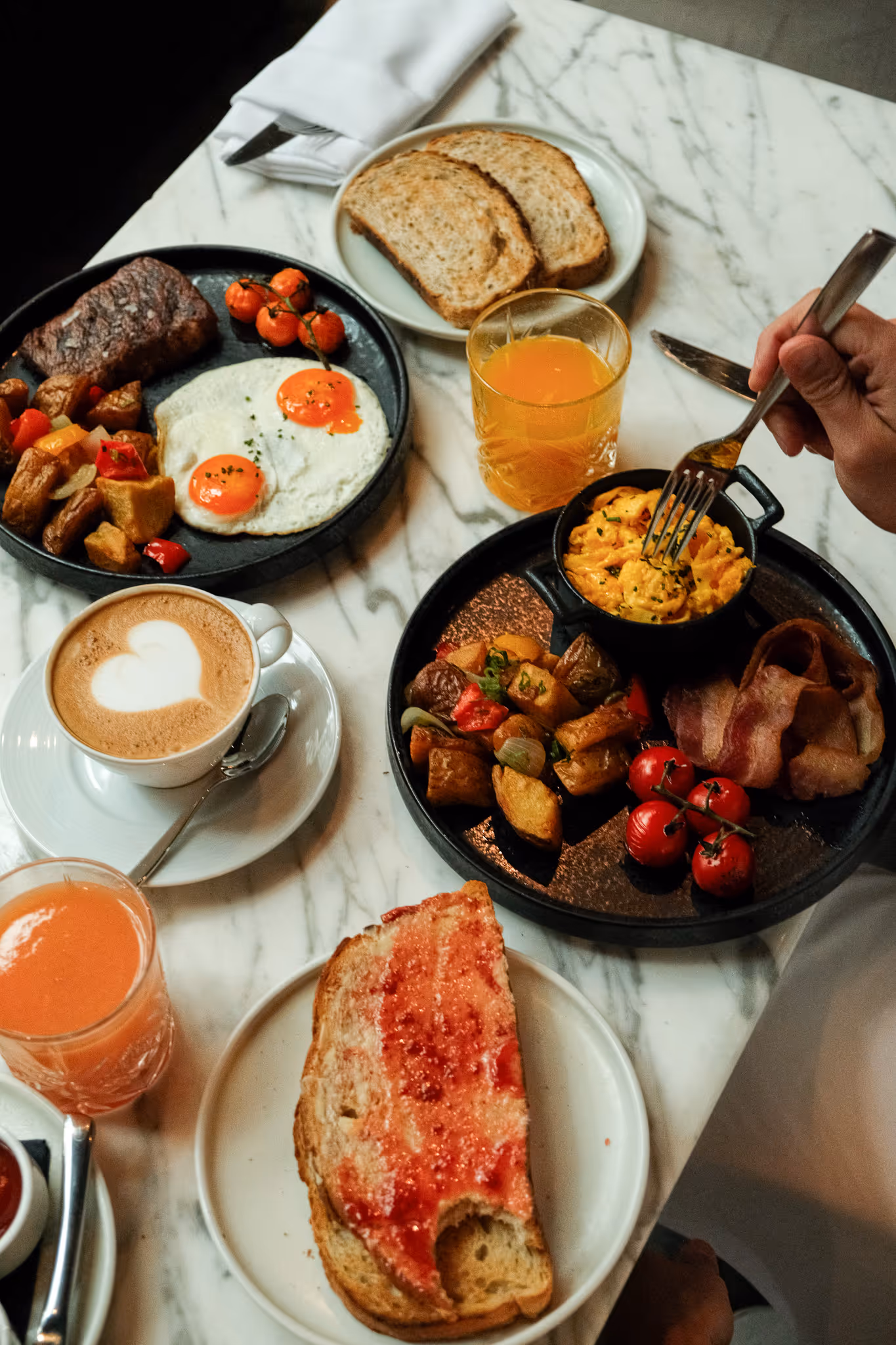 Toast, steak & egg, continental breakfast dishes at Paradox Hotel Vancouver 