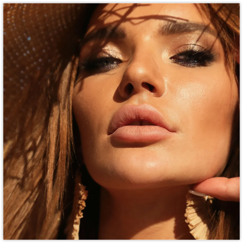 Sun-kissed woman with smooth skin and full lips, Restylane® filler in Chattanooga, TN
