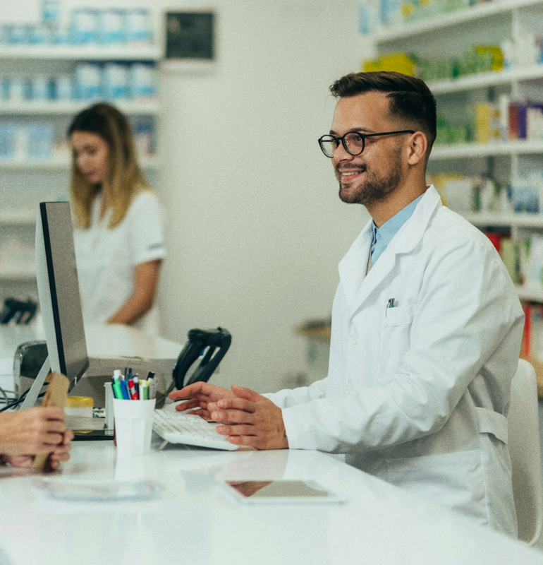 Pharmacist using computer
