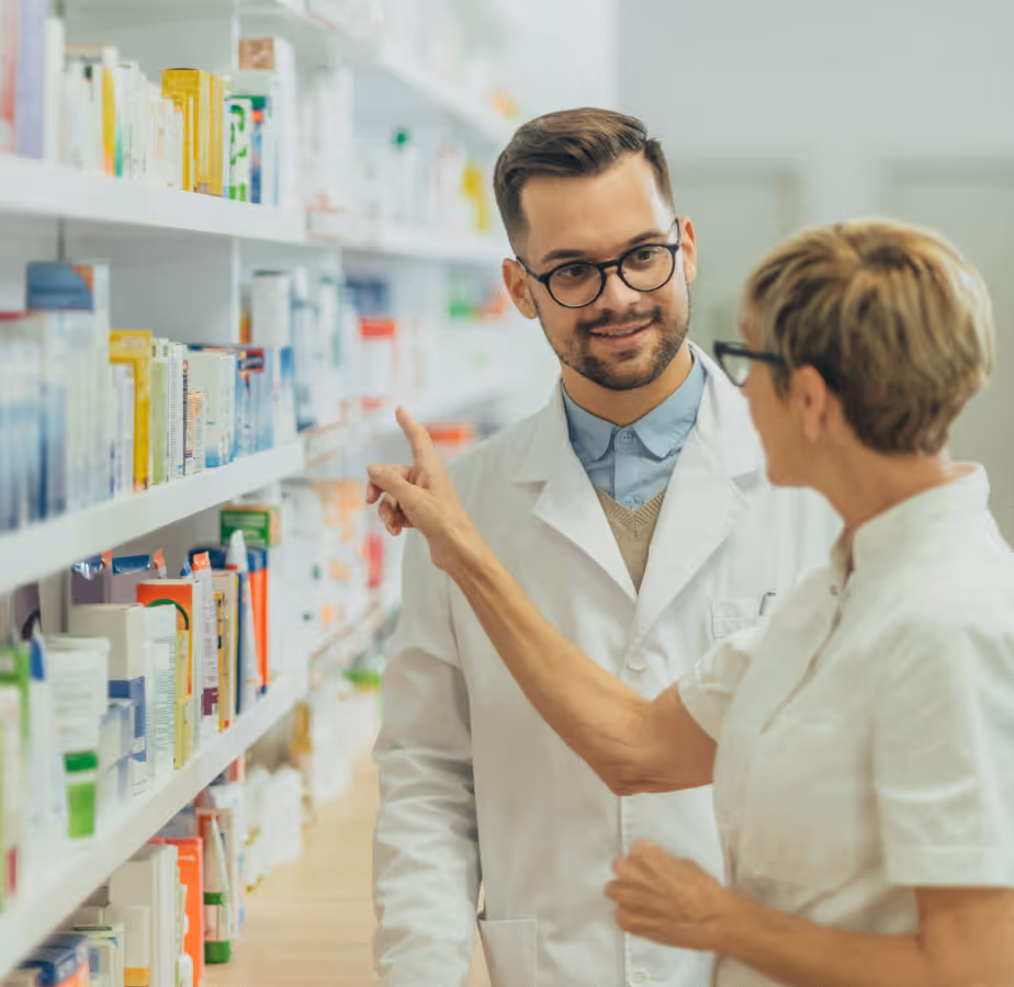 Two pharmacists discussing medicines