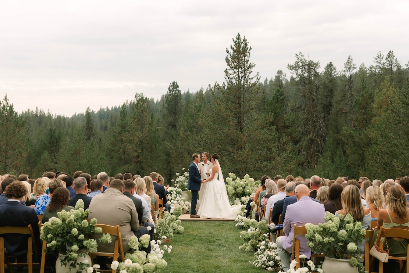 McCall Wedding ceremony with lush garden florals
