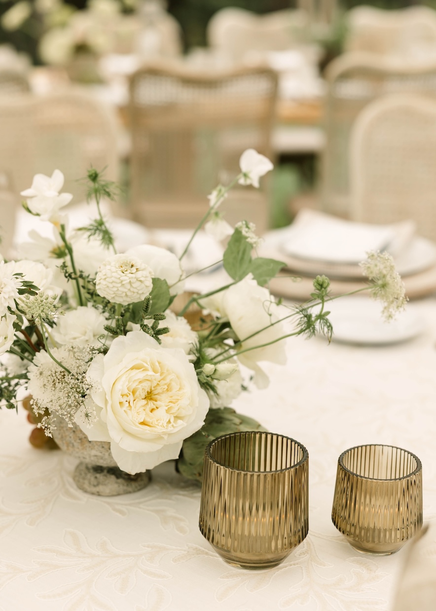 Centerpiece compote with white garden roses 
