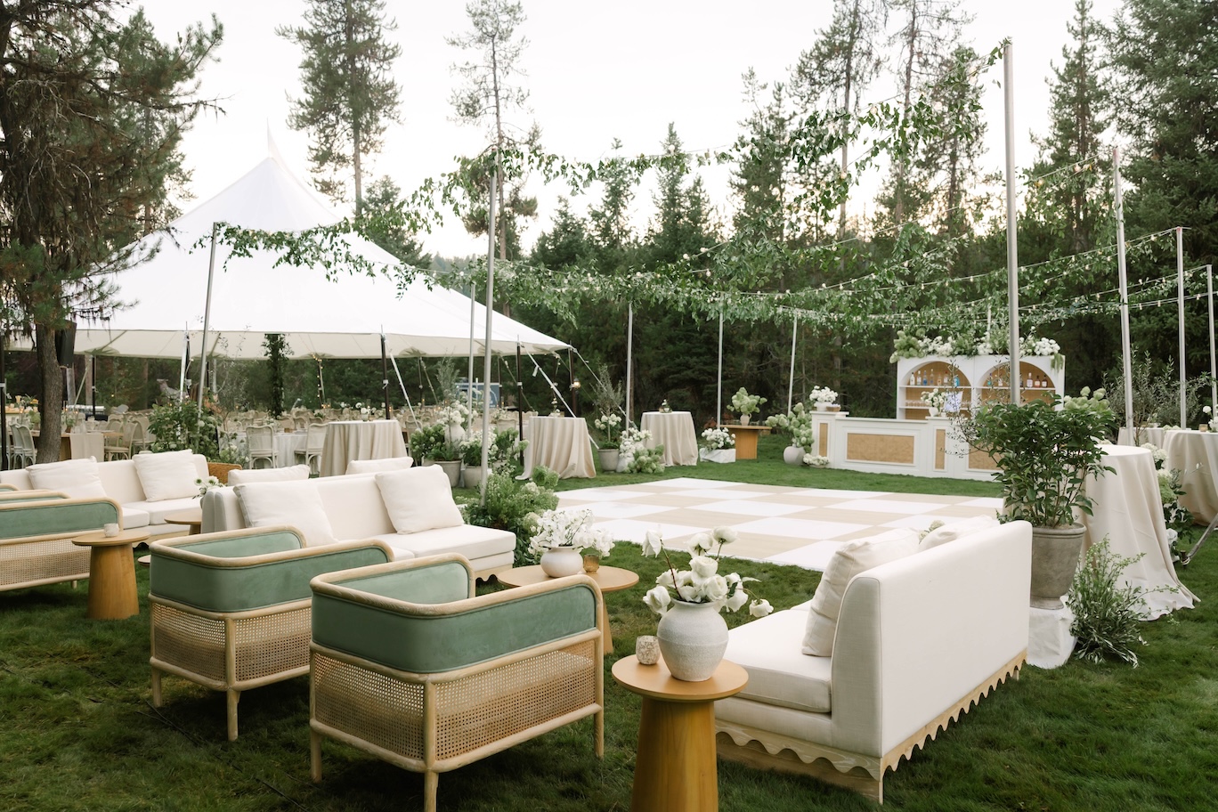 Lounge area of beautiful outdoor wedding reception in McCall