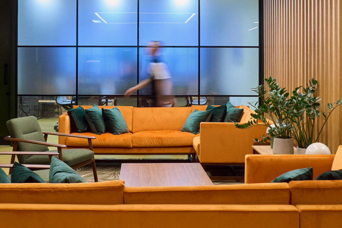 person walking through office