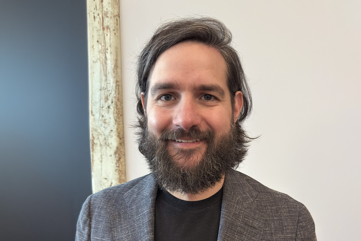Charlie Baldwin, Head of Intelligence, We. Communications, smiling for camera
