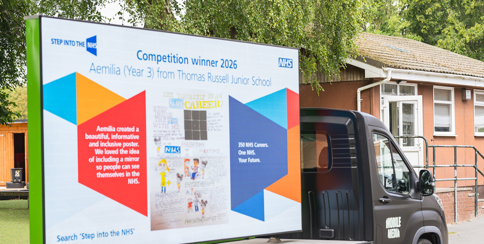 NHS poster winner displayed on a truck