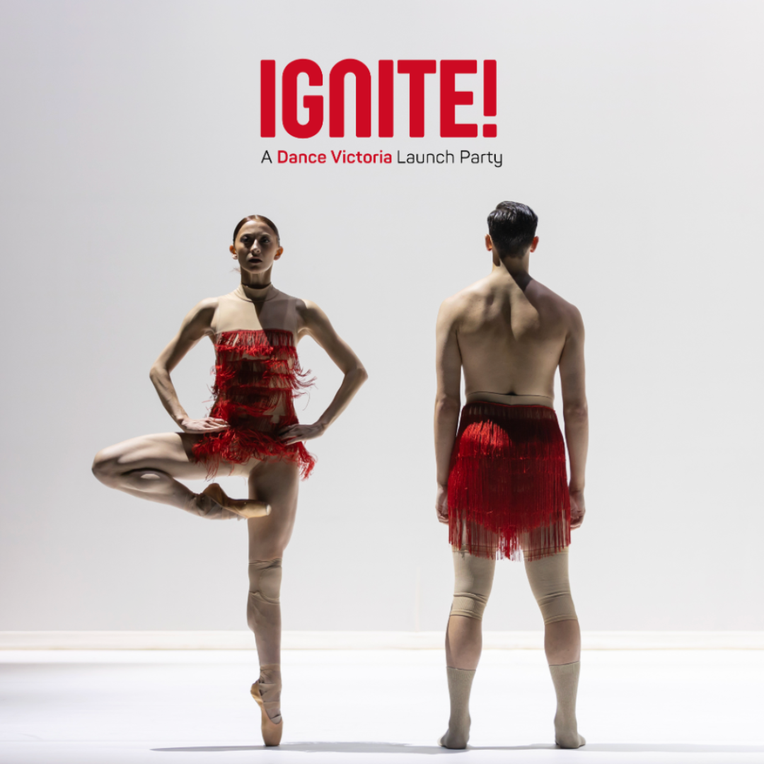 Two people in dance uniforms posing 
