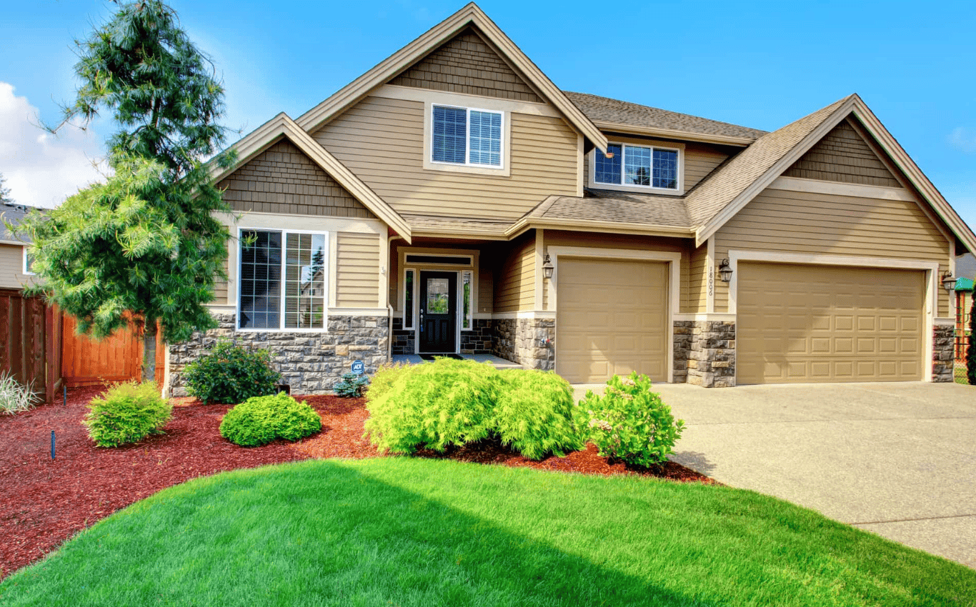 Row of townhomes with mixed siding styles and colors