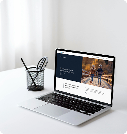 Open laptop displaying a website of a customer from pils design