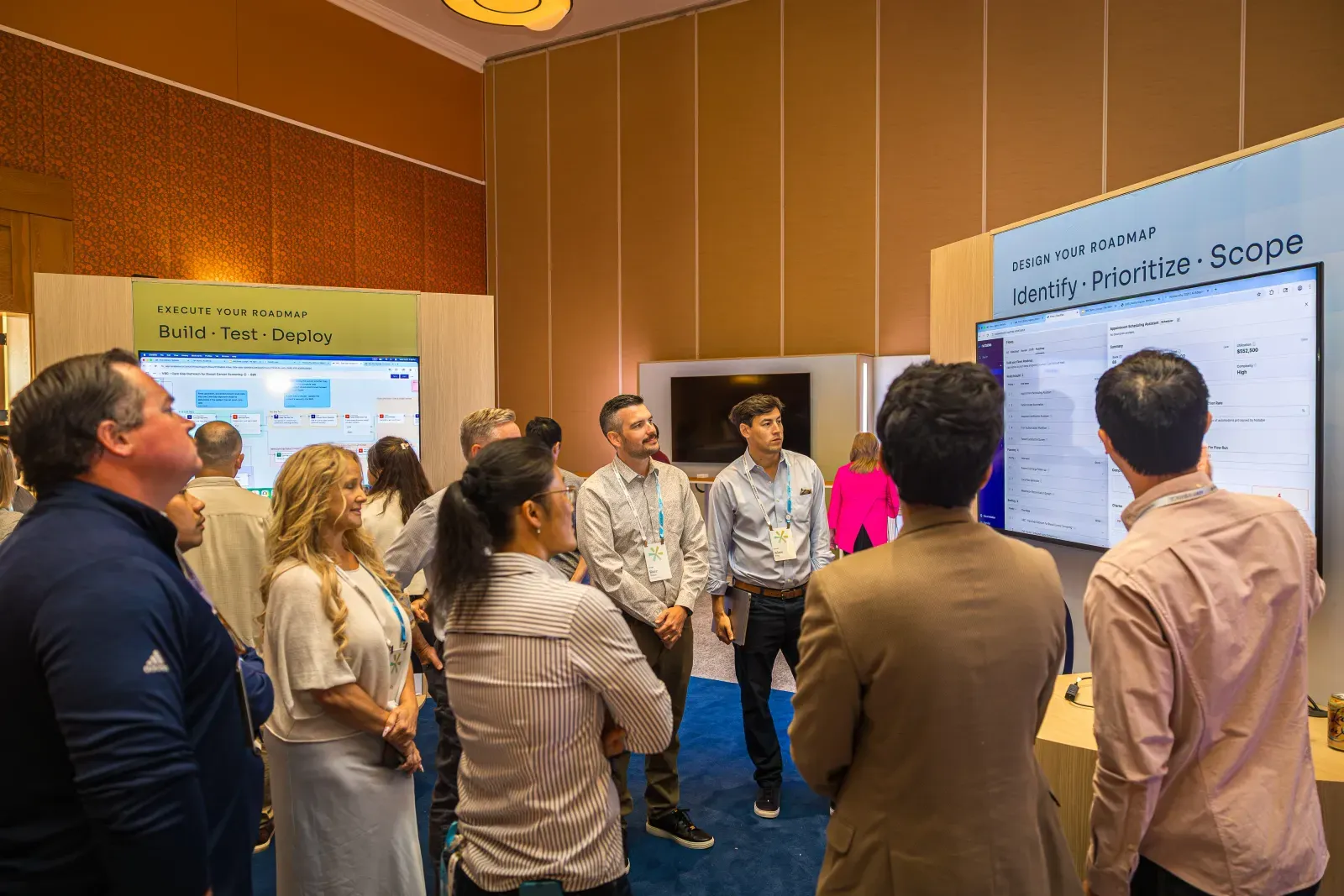 Attendees gathered in the Design Your Roadmap demo room