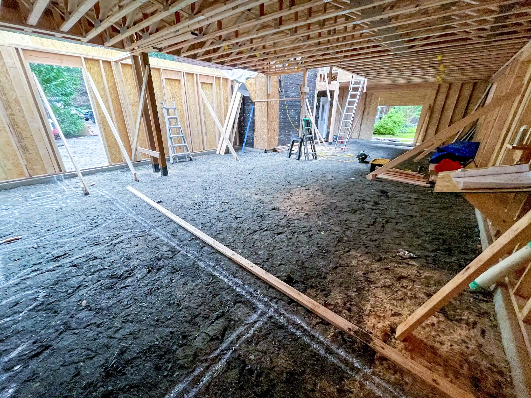 Angled photo of worksite during the framing process.