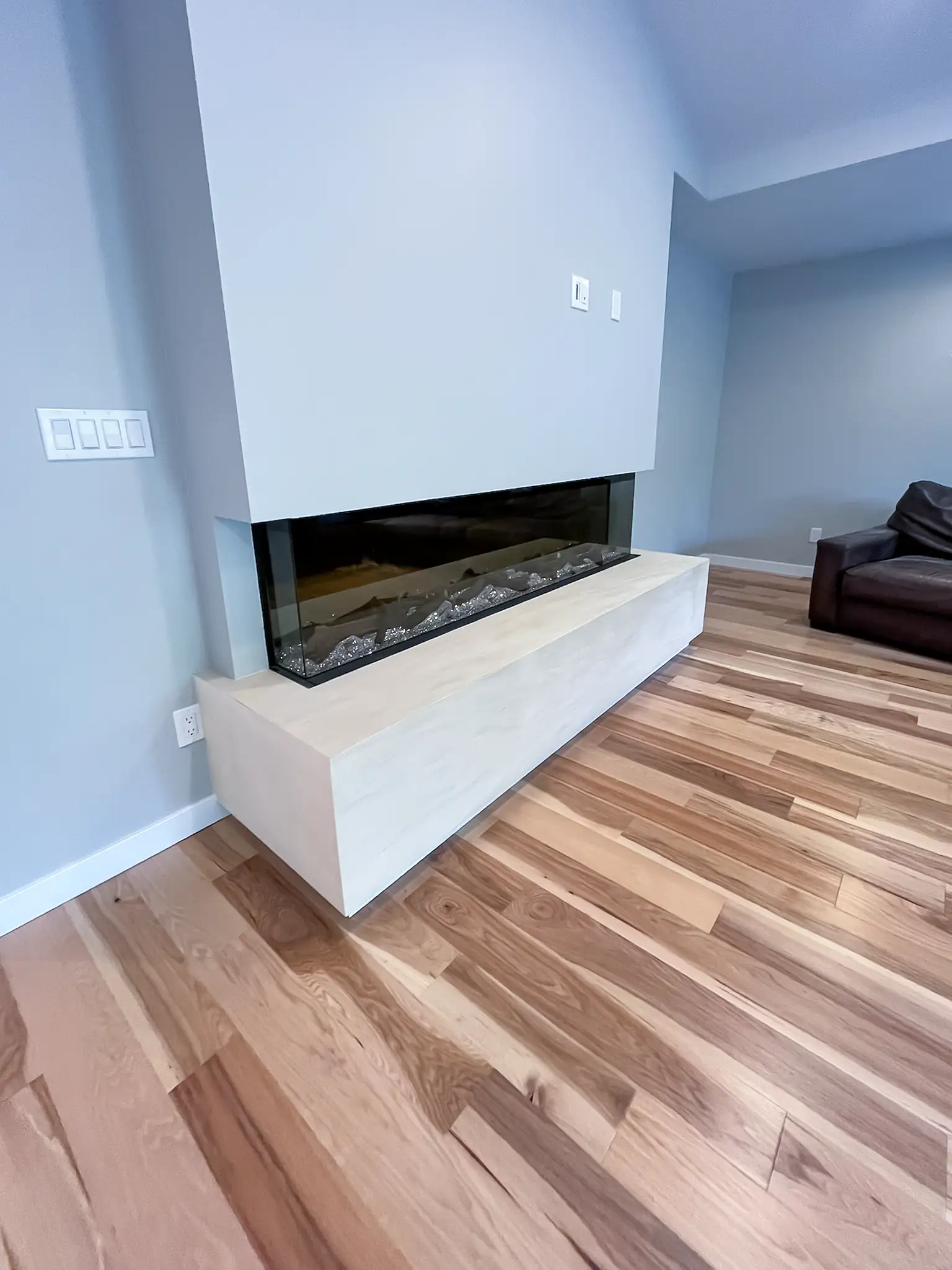 Vaulted living room ceiling above the remodeled fireplace in a Kirkland, WA rambler.