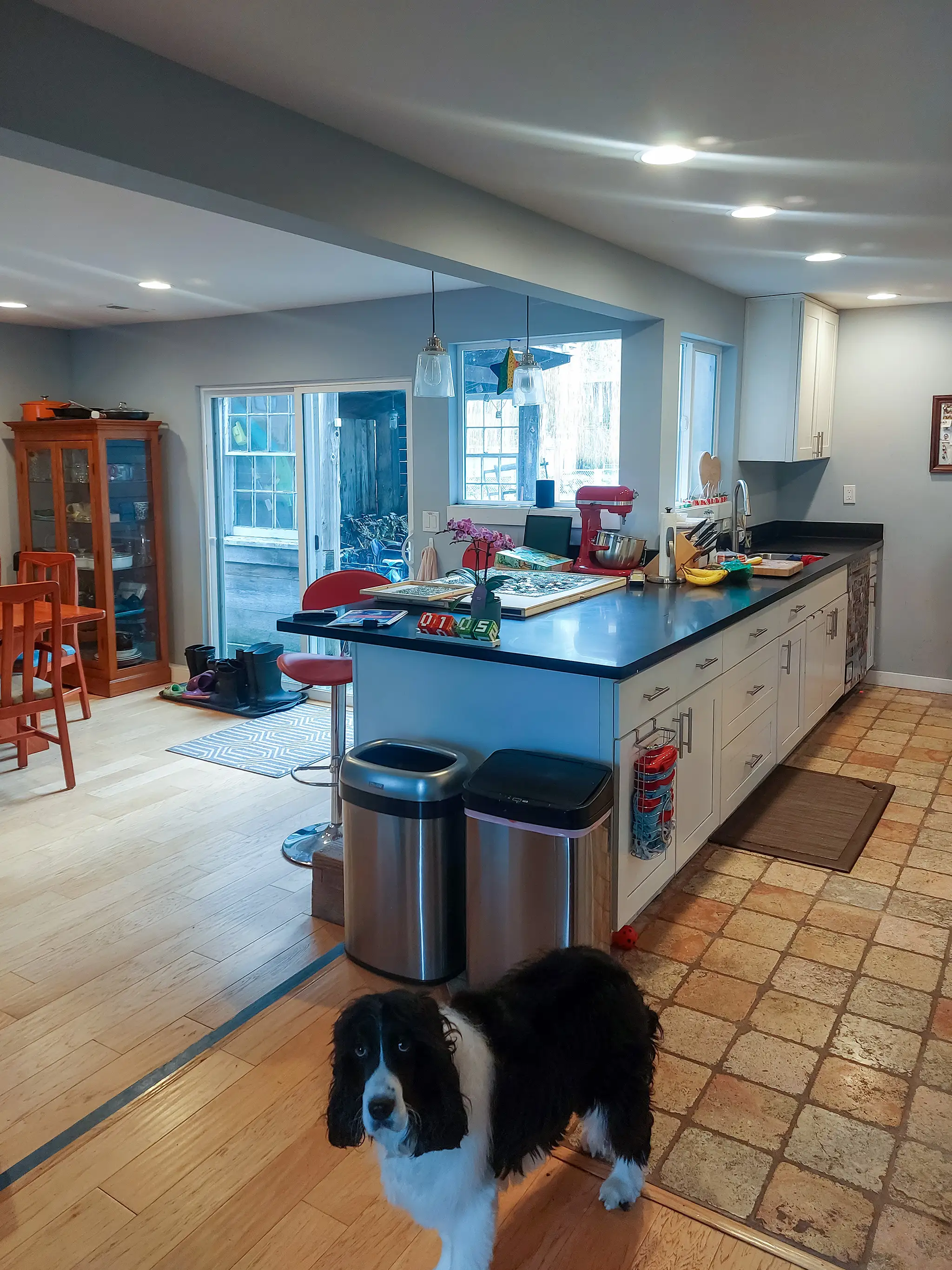 Kitchen and living room in a Kirkland, WA rambler before a whole-home remodel.