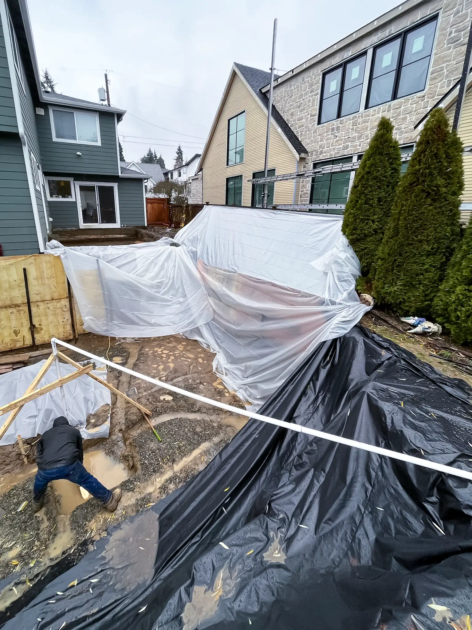 New deck foundation posts set during a Kirkland, WA backyard deck rebuild.