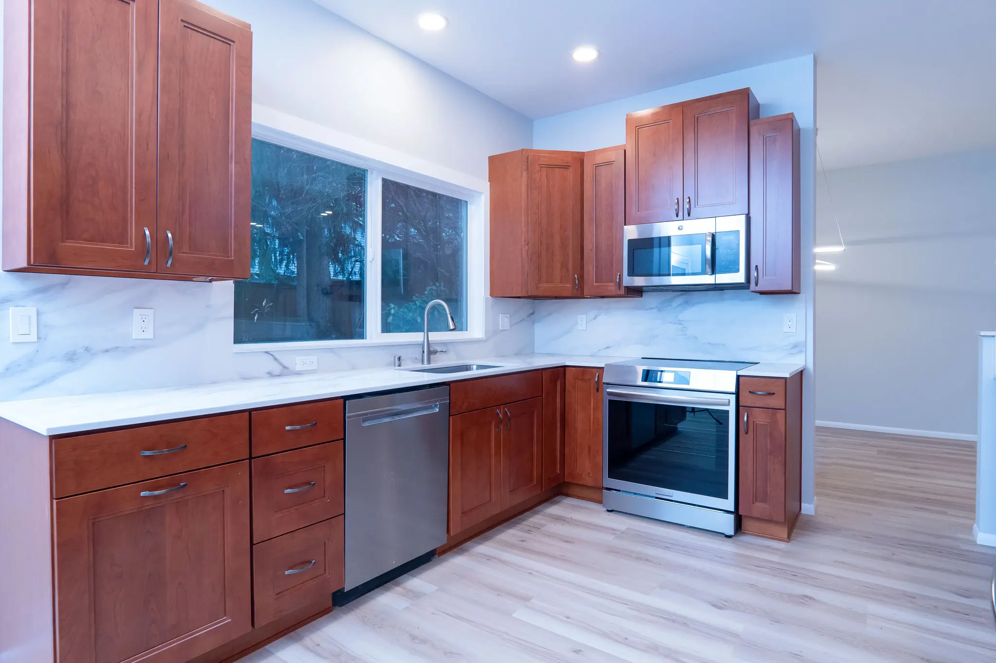 Angled front view of the remodeled kitchen cabinetry in Juanita, WA.