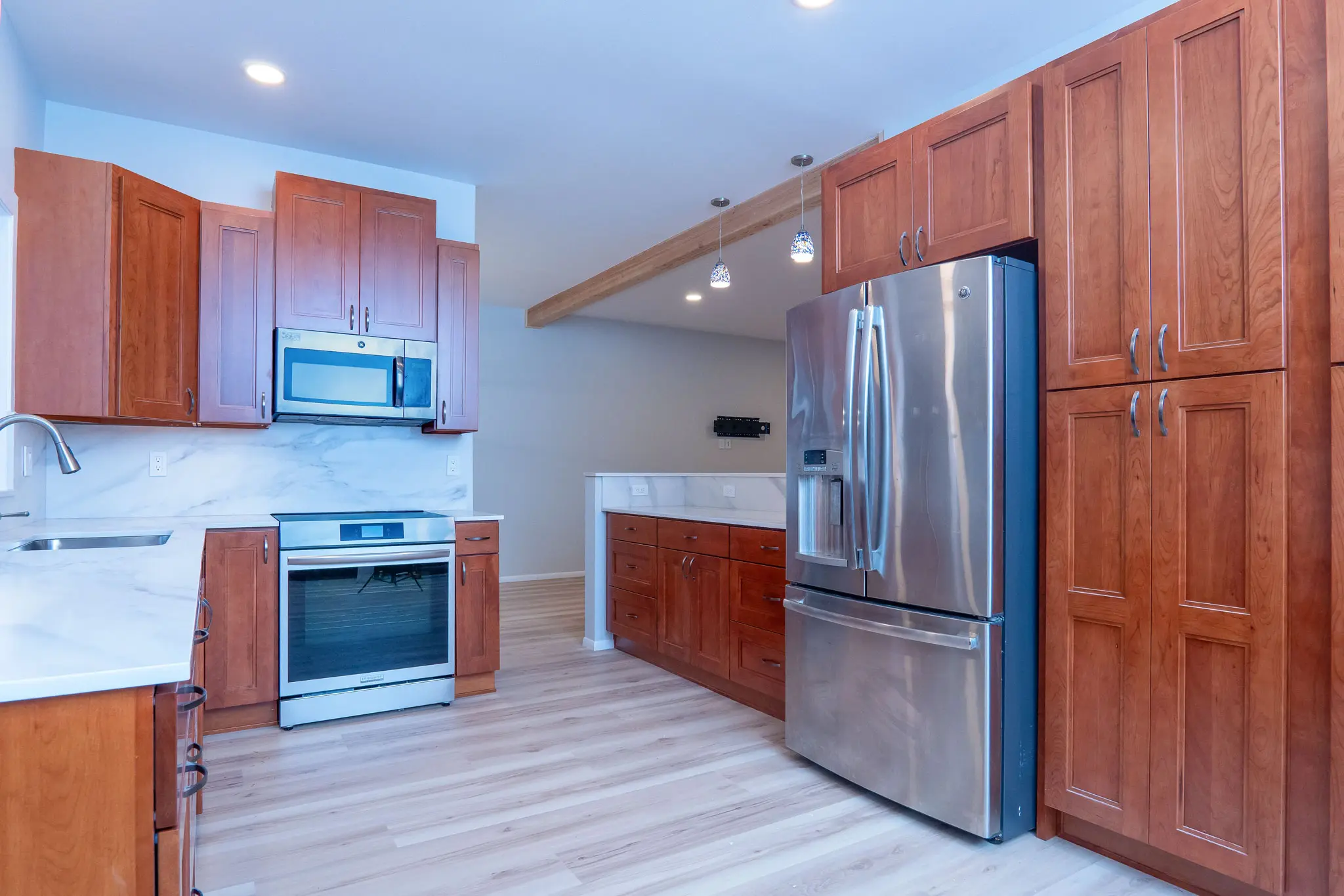 Angled front view of the remodeled kitchen in Juanita, WA.