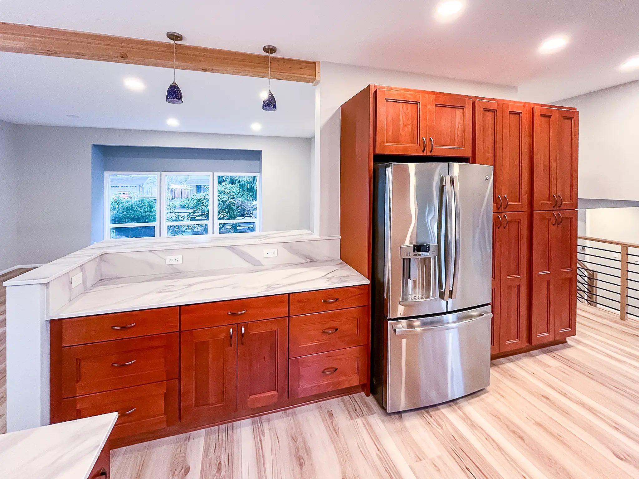 Side view of the remodeled kitchen showing custom cabinetry in Juanita, WA.