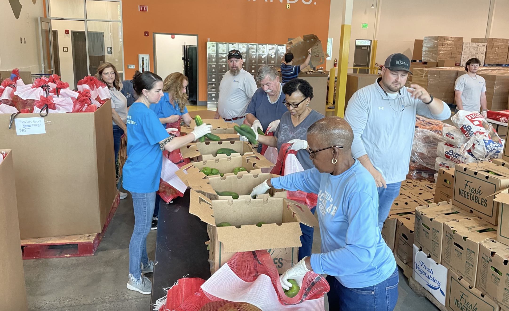 kamin employees participating in georgia food drive