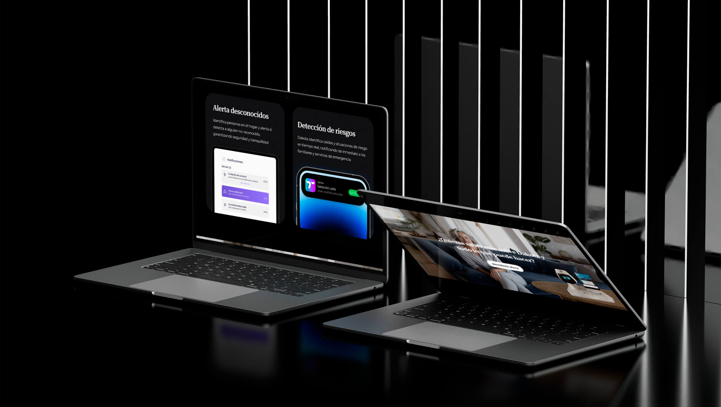 Dos laptops abiertos sobre una superficie negra, uno muestra funciones de alerta de desconocidos y detección de riesgos, el otro una persona en un sofá en una escena hogareña.