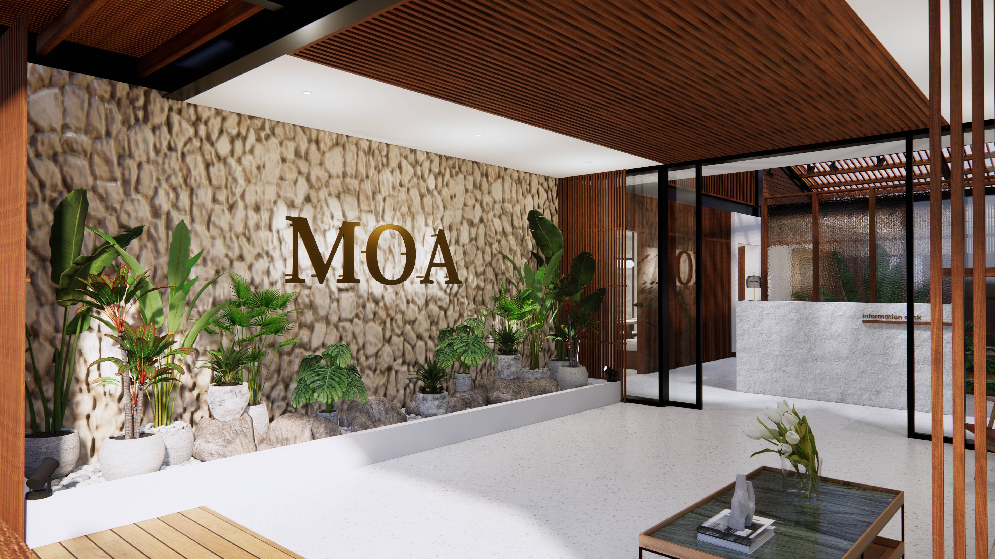 Modern reception area with stone-textured wall displaying the letters MOA, potted green plants, and a glass coffee table with flowers.
