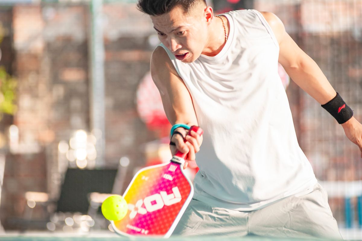 Pickleball Injuries Are Exploding — Here's How to Stay on the Court