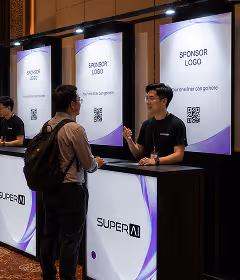 A group of people standing in front of a superai counter.