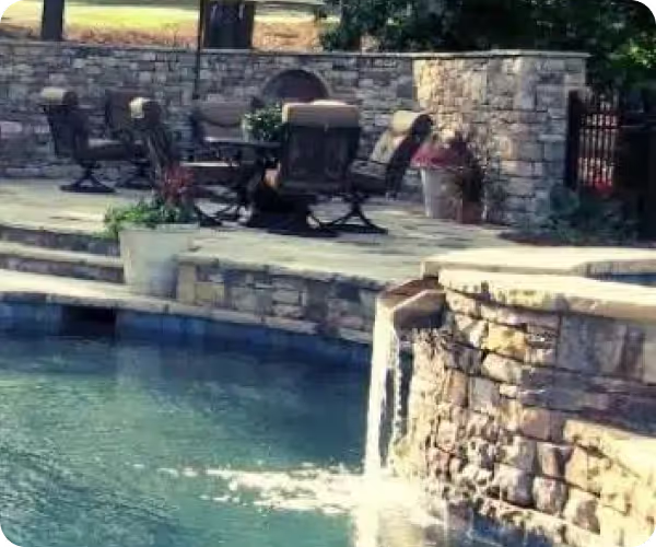 Same pool after professional remodel showing refreshed finish and clean water