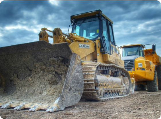 Industrial Equipment being loaded onto a truck which was sold by ListingHippo. The equipment is heavy machinery.