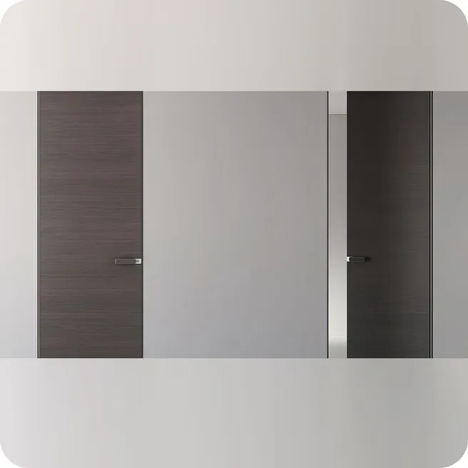 Minimal concealed door systems flush into wall for modern interiors.