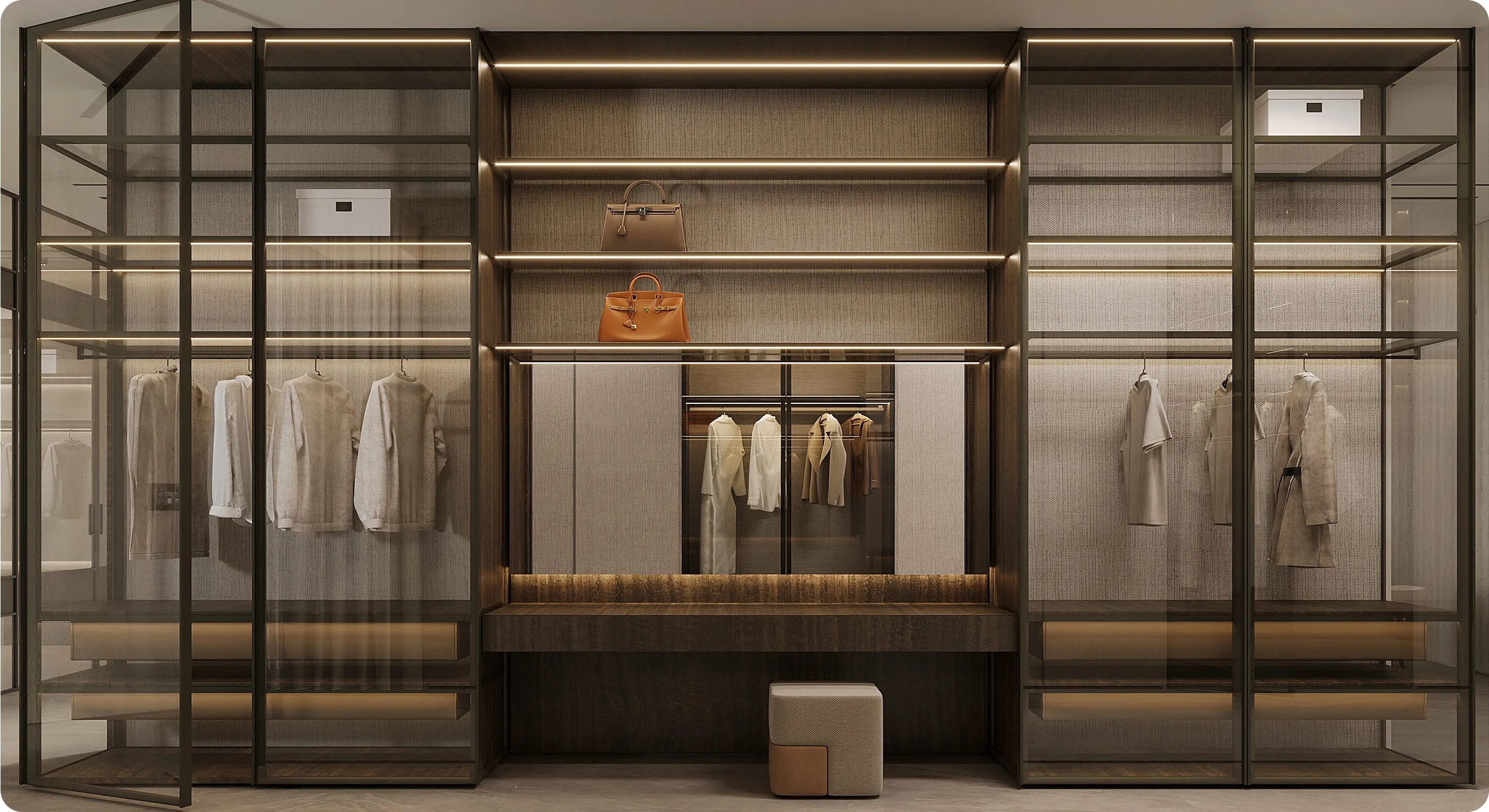 Custom walk in closet with multi-level shelves, hanging racks, and drawer systems