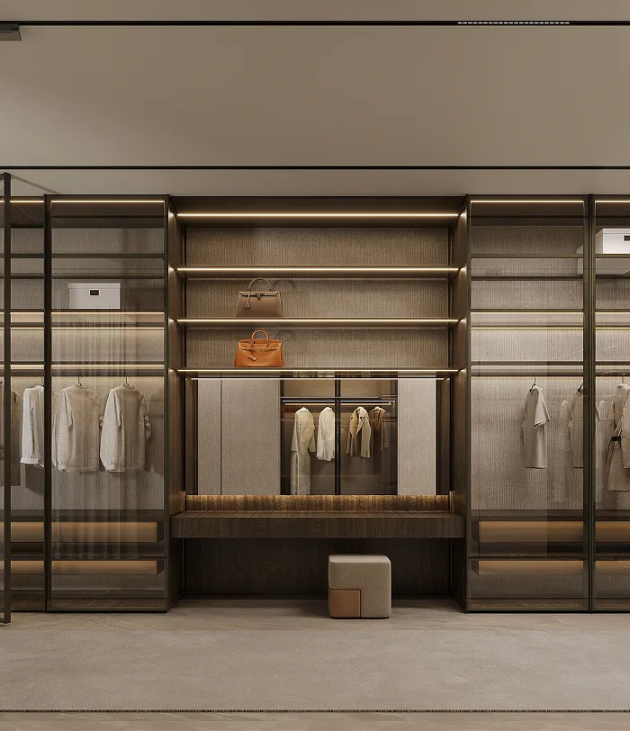 Contemporary wardrobe with integrated vanity, LED lighting, and personalized drawer configuration.