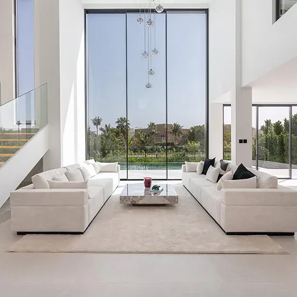 Villa interior design with floor to ceiling expansive glass windows in Dubai