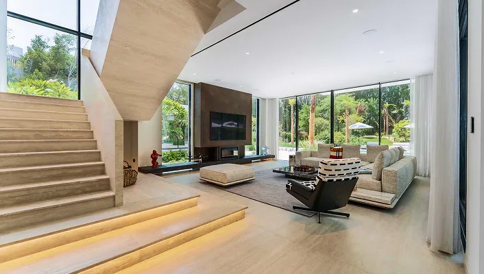 Modern villa interior design with floor to ceiling glass panels