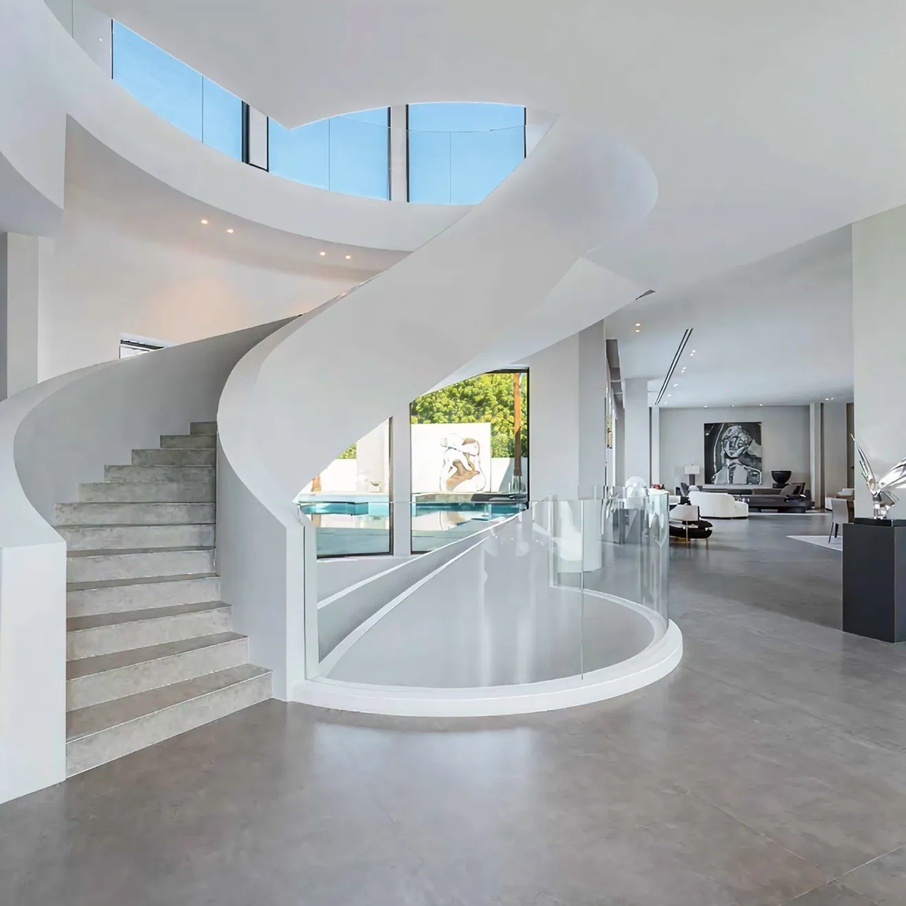 Renovated villa featuring a striking white helical staircase