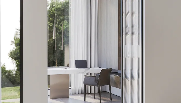 Modern home office with white marble desk, custom-designed dark grey chair, and expansive windows in a luxury villa