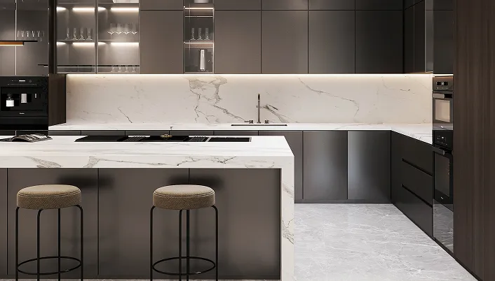 Modern kitchen interior design featuring a marble-patterned quartz island with a sink and bar stools, custom cabinetry, and integrated appliances